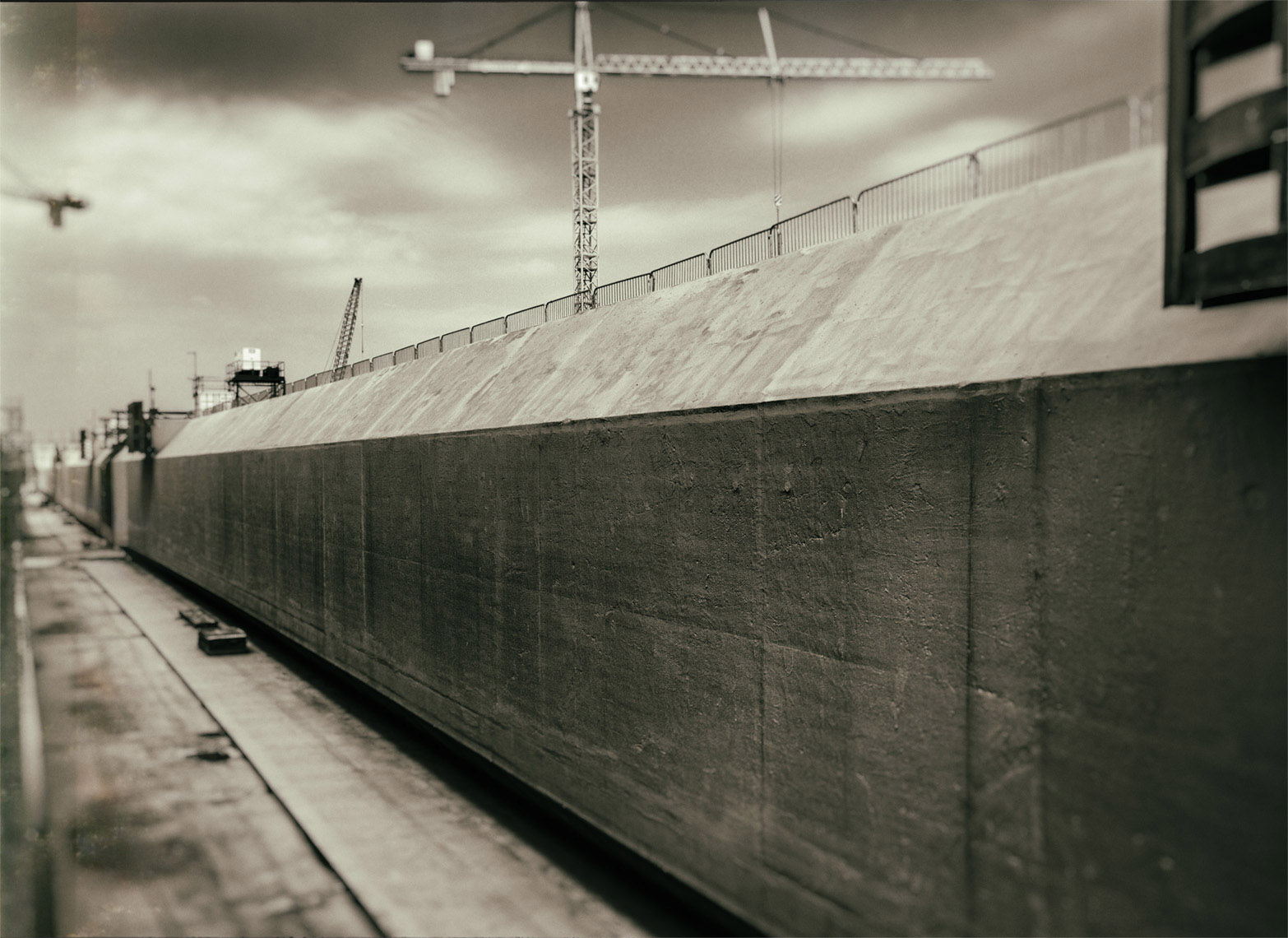 fine art photograph of under water tunnel element under construction